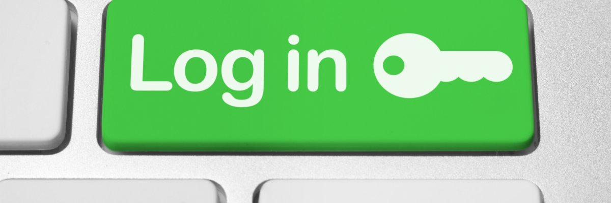 Login im Bürgerportal Ein Ausschnitt einer Tastatur. Auf der Enter-Taste steht auf grünem Hintergrund Login mit Schlüsselsymbol.